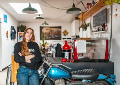 Andrea at Moto Revere, her DIY motorcycle & coffee shop - Build Train Race